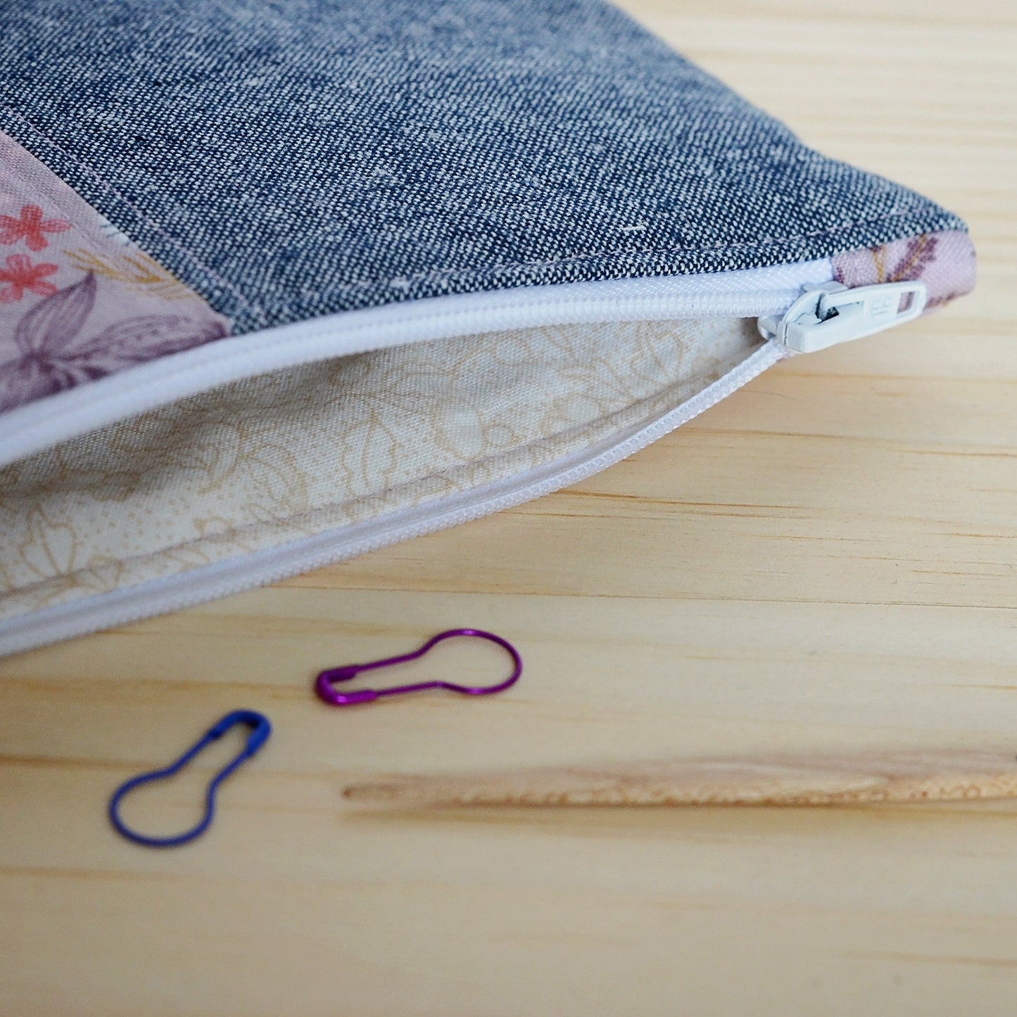 Mauve floral and indigo linen knitting accessory pouch. Made in Nova Scotia, Canada by Yellow Petal Handamde.