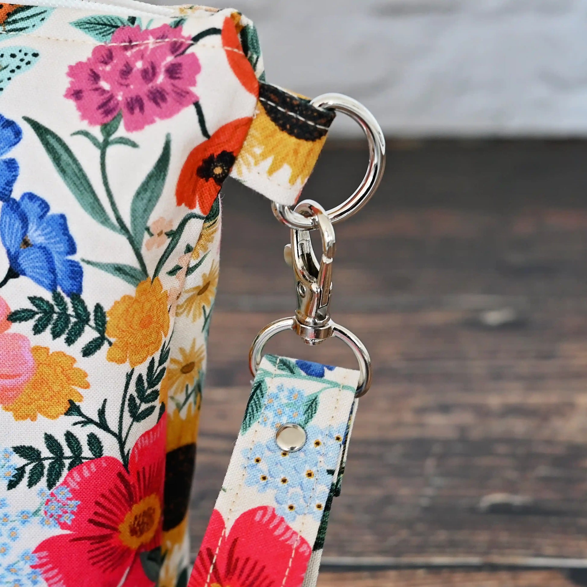 Pretty blush floral zippered pouch with wrist strap.  Made in Canada by Yellow Petal Handmade.