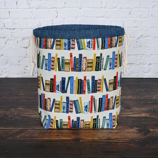 Book Club drawstring project bag from Rifle Paper's Curio collection.  Lined in a pretty blue and white striped cotton.  Made in Canada by Yellow Petal Handmade.