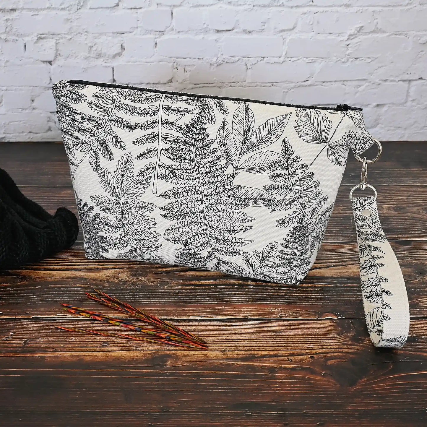 Beautiful fern print pouch made from a cream and black canvas and lined in a cotton of the same pattern.  This pouch is great for your small projects or could be used for pretty much anything!  Made in Canada by Yellow Petal Handmade.