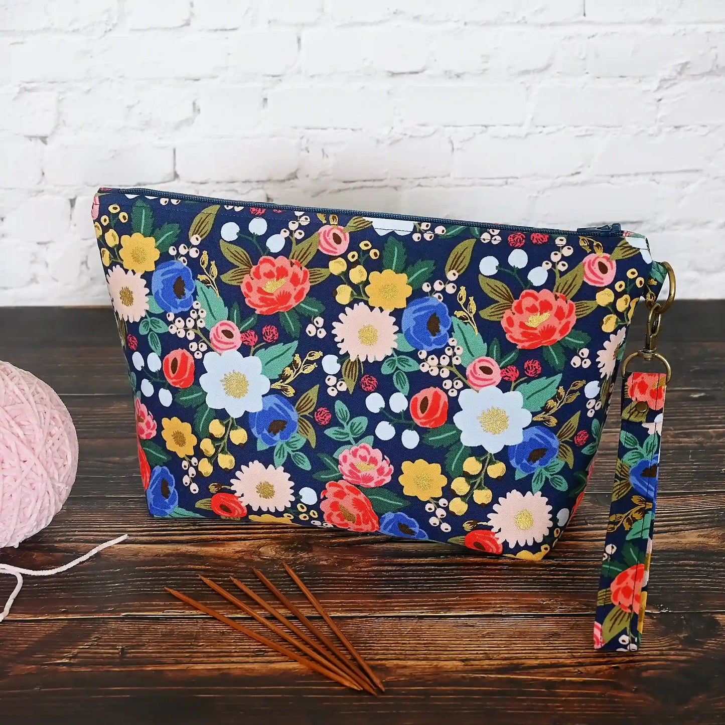 Pretty navy floral project bag with zipper and wrist strap.  Made from Rifle Paper Co's Antique Garden.  Made in Nova Scotia, Canada by Yellow Petal Handmade.