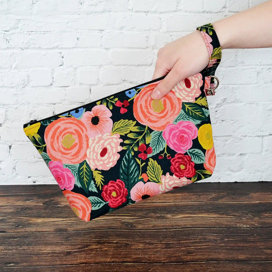 Canvas zippered project bag in a striking floral print with a black background.  Designed for small projects using Rifle Paper Co. fabric.  Made in Nova Scotia, Canada by Yellow Petal Handmade.