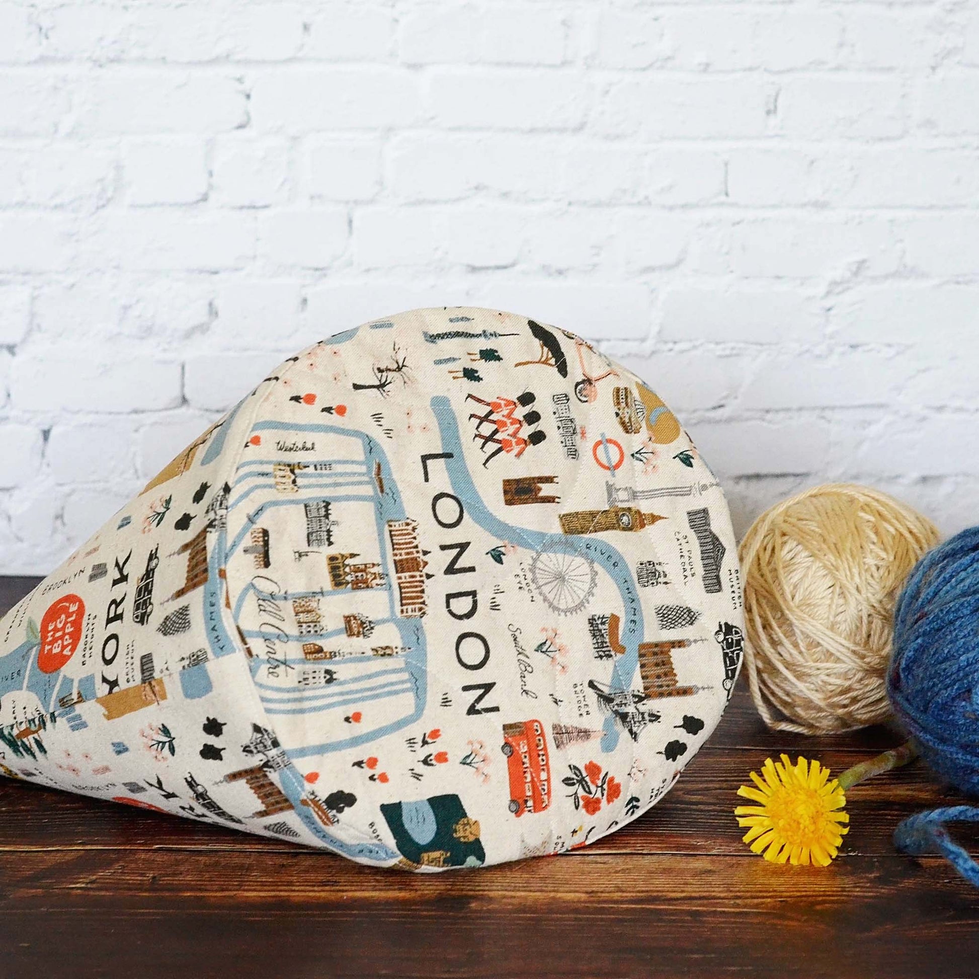 Travel themed bucket style knitting bag with plenty of interior pockets.  Made from the Bon Voyage collection by Rifle Paper Co.  Made in Canada by Yellow Petal Handmade.