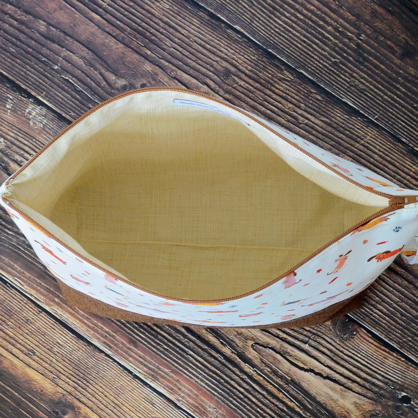 Fall themed knitting project bag with cute dogs and leaves.  Handmade in Nova Scotia, Canada by Yellow Petal Handmade.