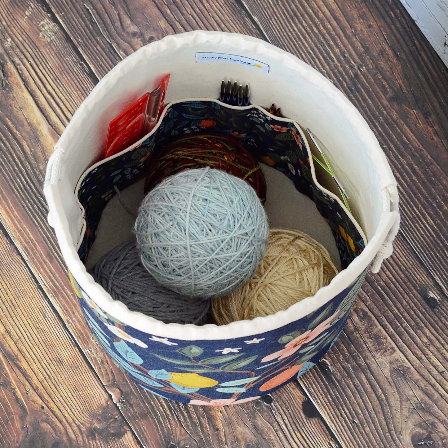 Navy citrus bucket bag for knitting or crochet.  Made from Bramble canvas by Rifle Paper Co.  Handmade in Canada by Yellow Petal Handmade.