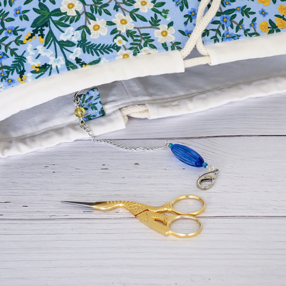 Blue canvas bucket style project bag with scissor chain.  Handmade in Nova Scotia Canada.