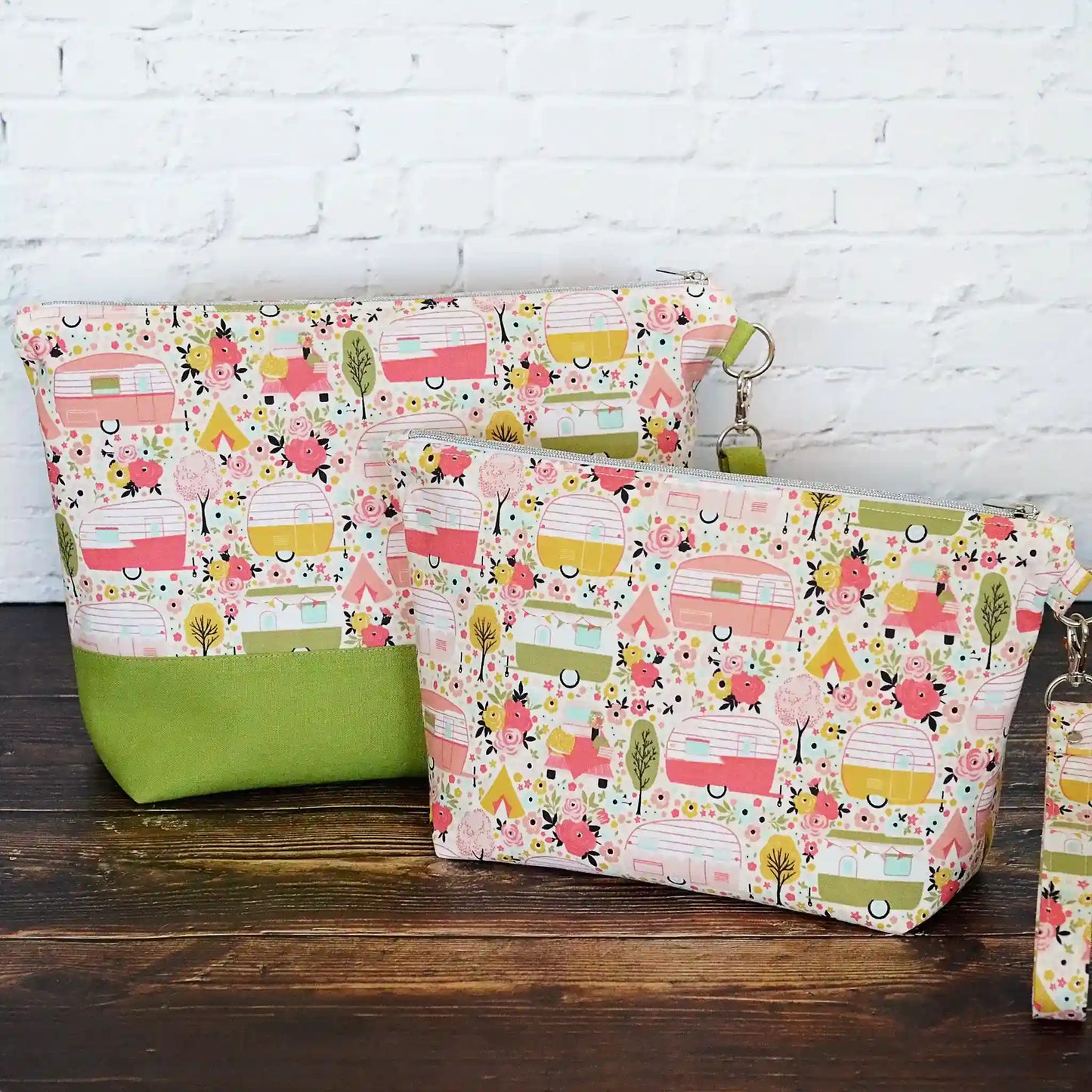 Vintage Camper themed project bag with zipper, pockets and a removable strap.  Paired with a lime green linen and lined in a pretty floral.  Made in Canada by Yellow Petal Handmade.