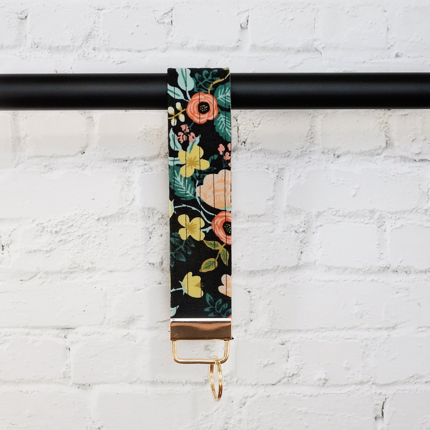 Keychain wristlets in Rifle Paper Co. fabrics and gold hardware.  Made in Canada by Yellow Petal Handmade.