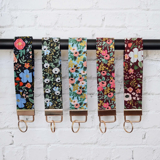 Keychain wristlets in Rifle Paper Co. fabrics and gold hardware.  Made in Canada by Yellow Petal Handmade.