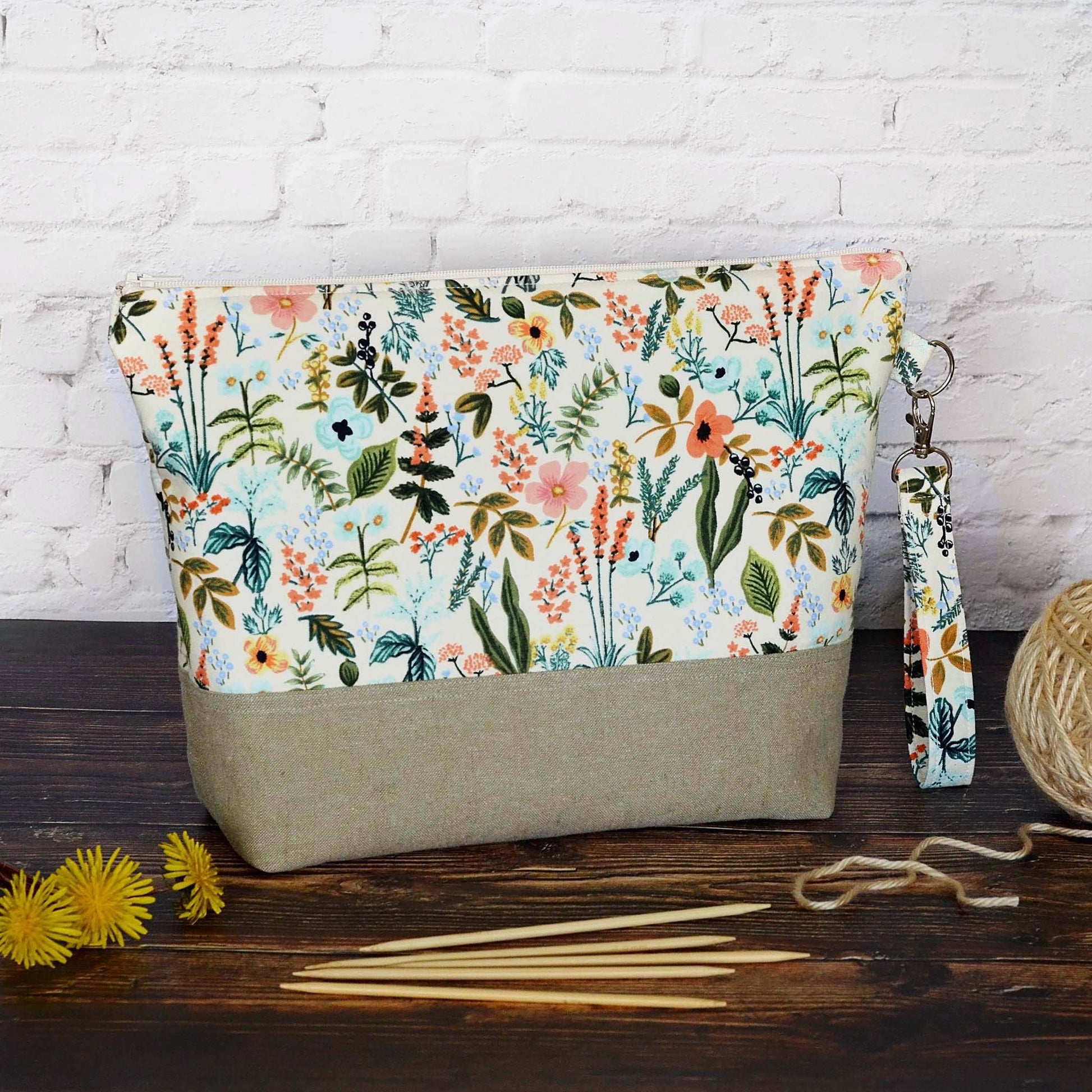 Zippered project bag in Rifle Paper Amalfi fabric paired with a Kaufman linen.  Comes with removable strap.  Made in Canada by Yellow Petal Handmade.