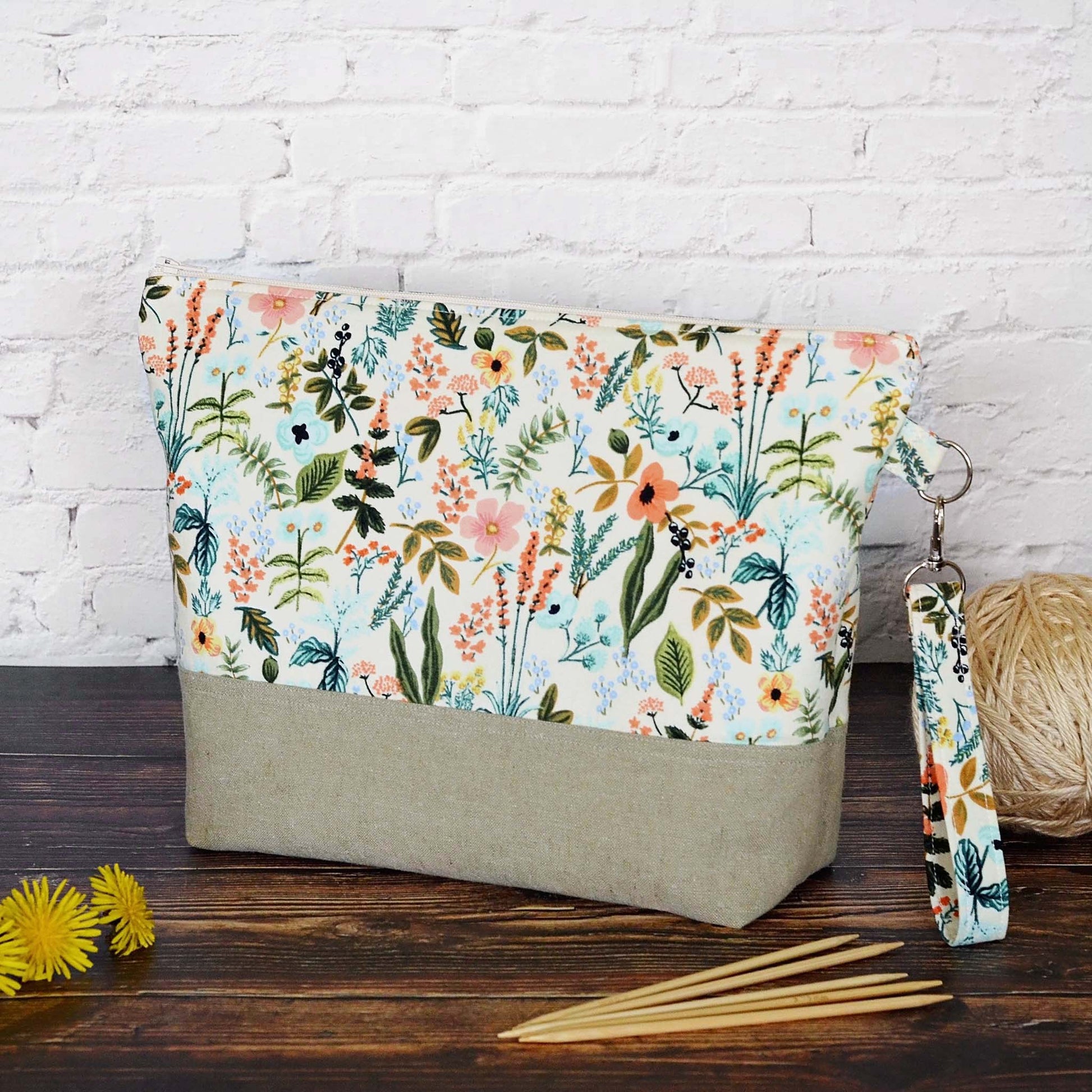 Zippered project bag in Rifle Paper Amalfi Herb Garden fabric paired with a Kaufman linen.  Comes with removable strap.  Made in Canada by Yellow Petal Handmade.
