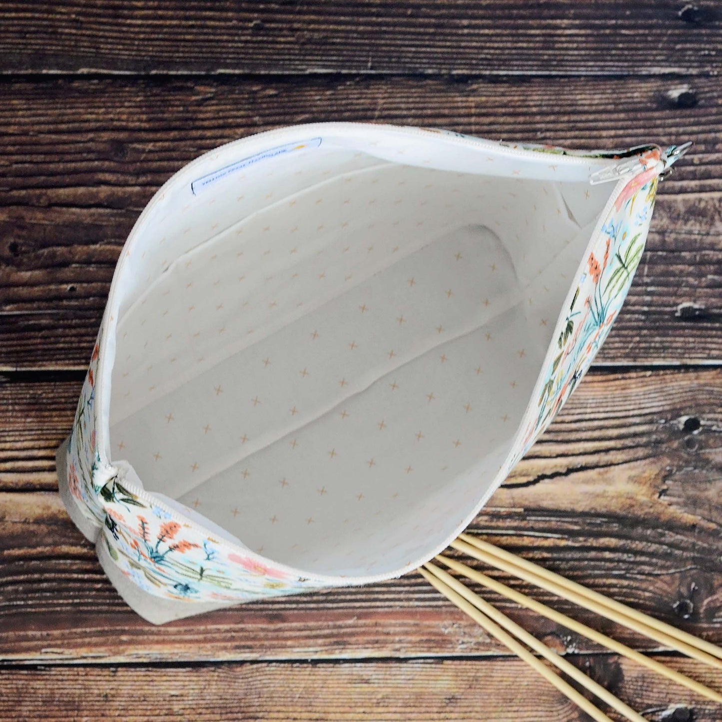 Zippered project bag in Rifle Paper Amalfi fabric paired with a Kaufman linen.  Comes with removable strap.  Made in Canada by Yellow Petal Handmade.