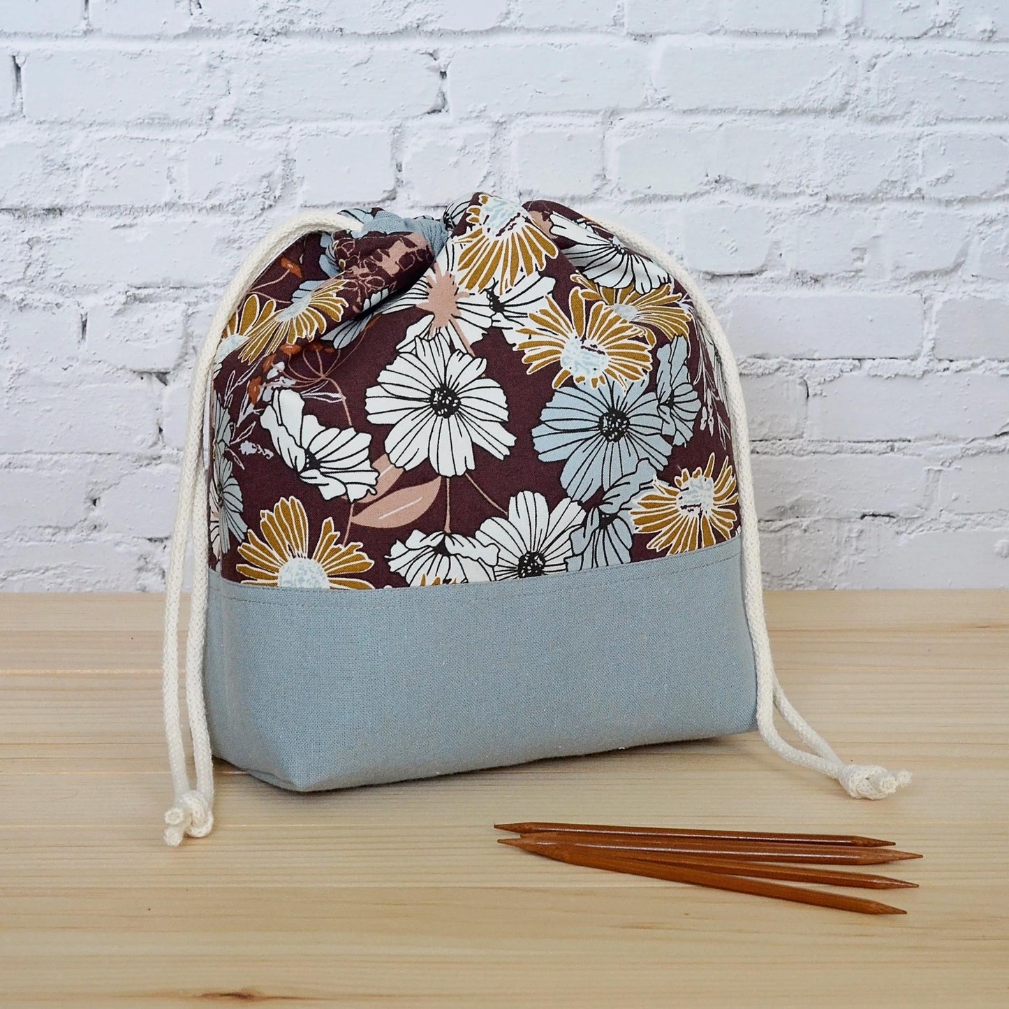 Small floral project bag for knitting or crochet in blues and browns.  Made in Nova Scotia, Canada.