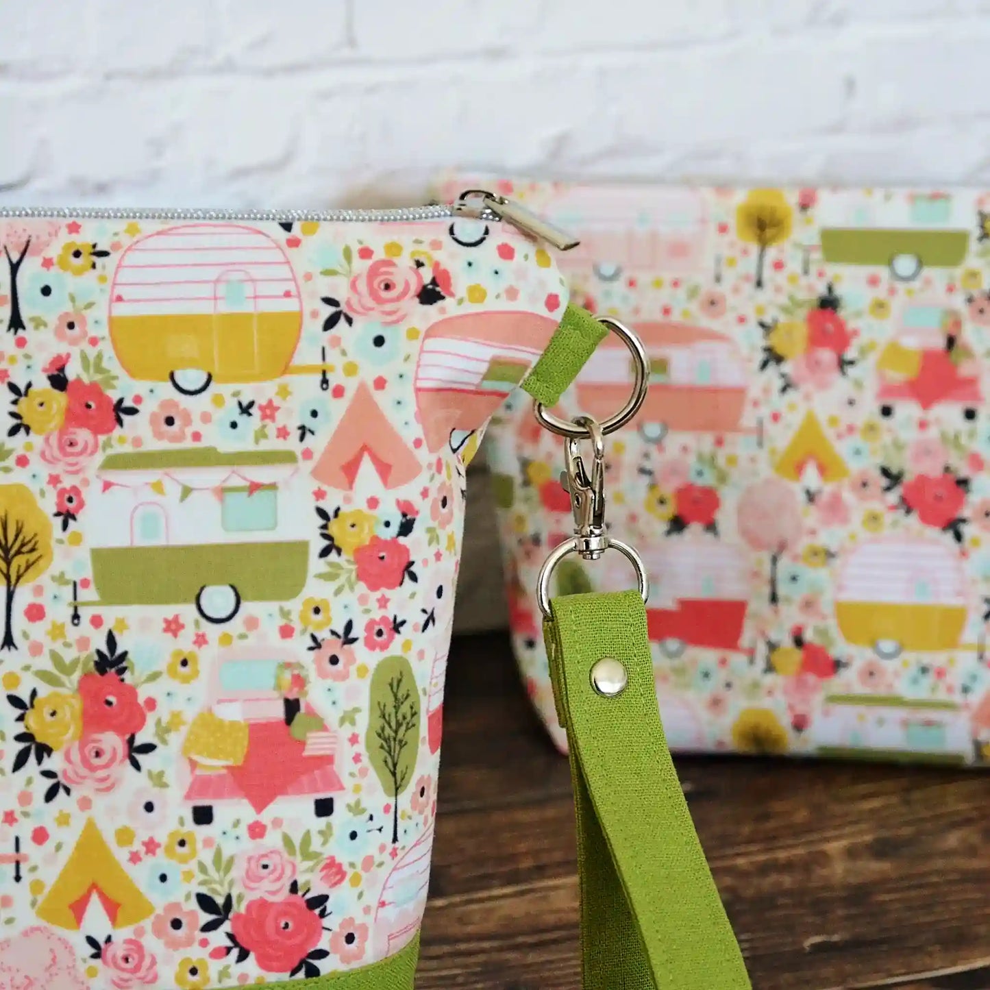 Vintage Camper themed project bag with zipper, pockets and a removable strap.  Paired with a lime green linen and lined in a pretty floral.  Made in Canada by Yellow Petal Handmade.