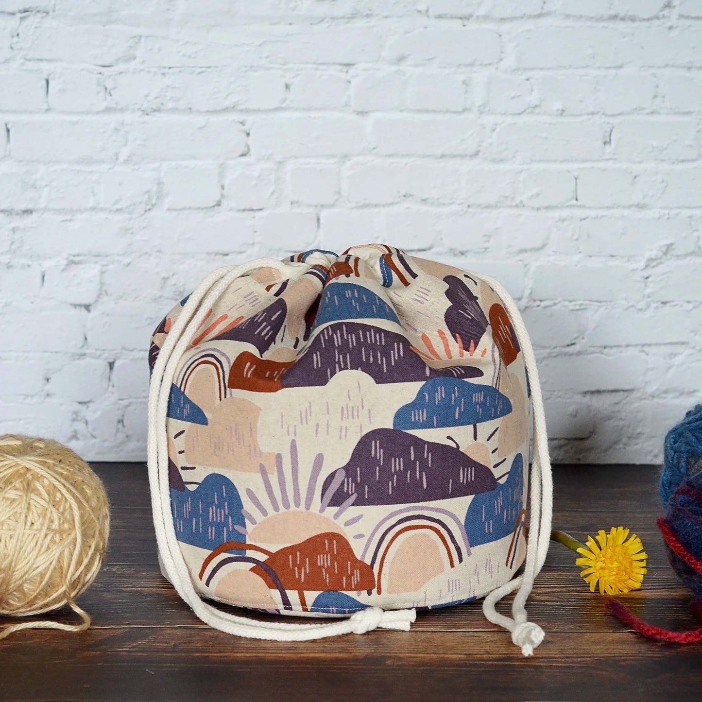 Rainbow knitting bag in canvas with multiple pockets  Handmade in Nova Scotia, Canada by Yellow Petal Handmade.