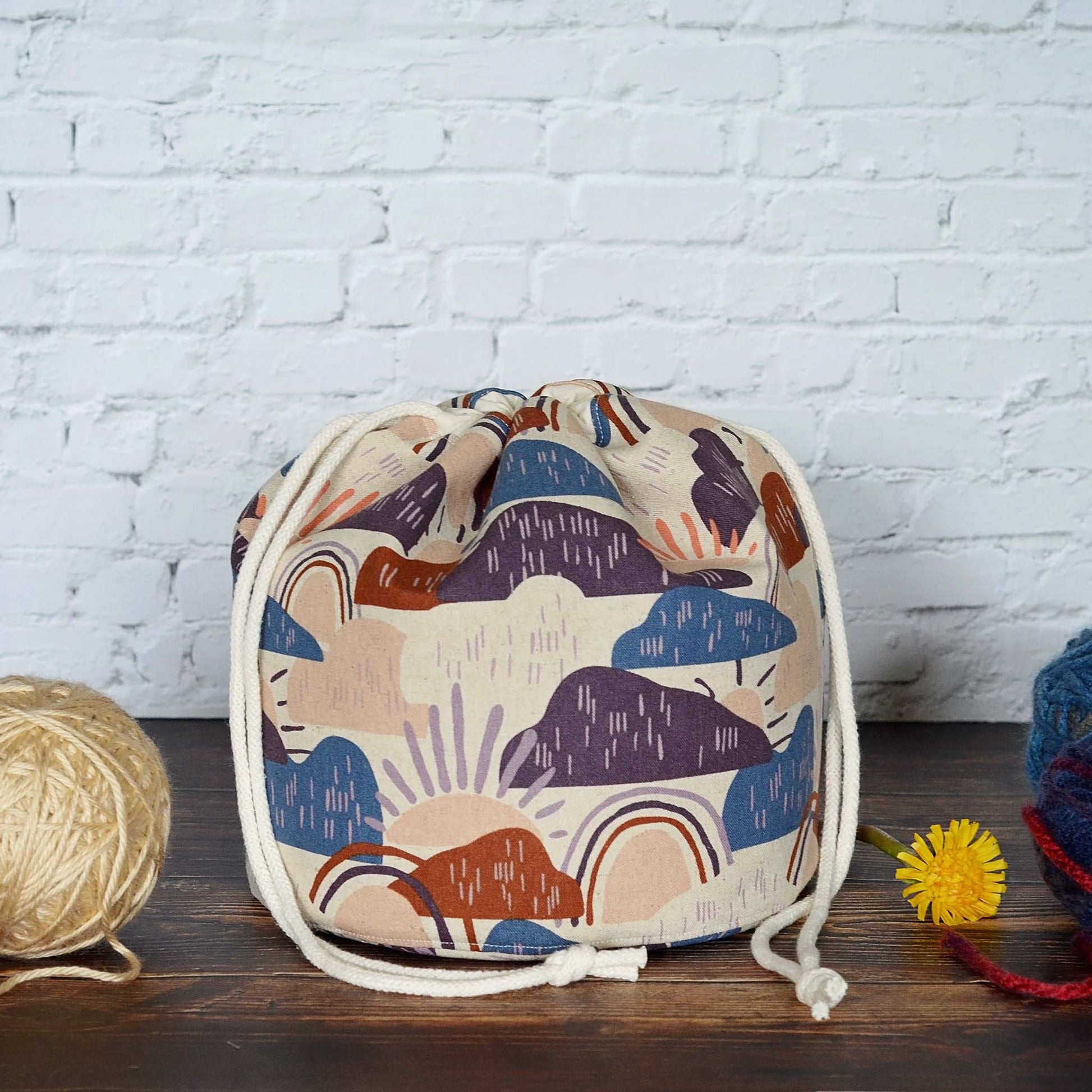 Rainbow knitting bag in canvas with multiple pockets  Handmade in Nova Scotia, Canada by Yellow Petal Handmade.